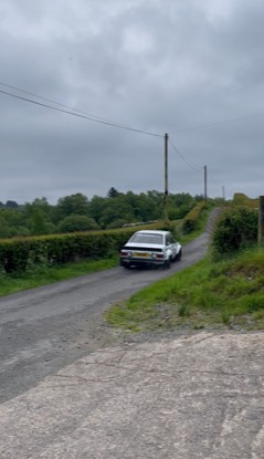 Twincam race on nar4row Irish lanes.